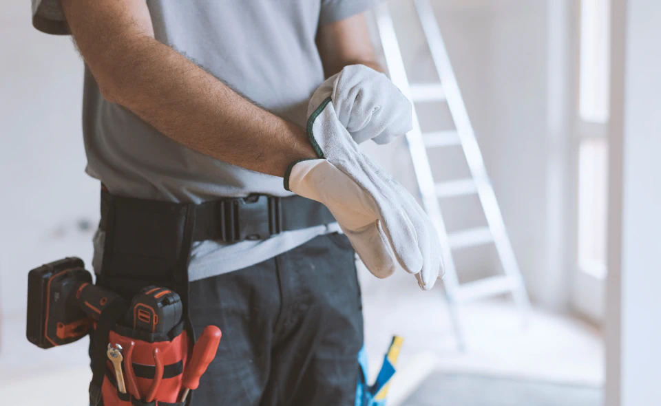 handyman worker wearing gloves